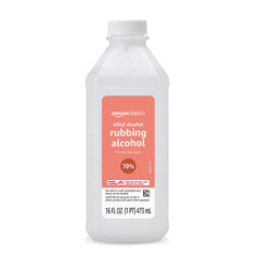 Amazon Basics 70% rubbing alcohol bottle pouring for quick surface cleaning