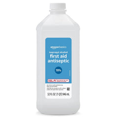 Amazon Basics first aid antiseptic bottle close-up for sanitizing scrapes.