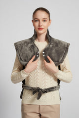 Ambershine XXXL heating pad spread on bed for full-body warmth across back and shoulders.