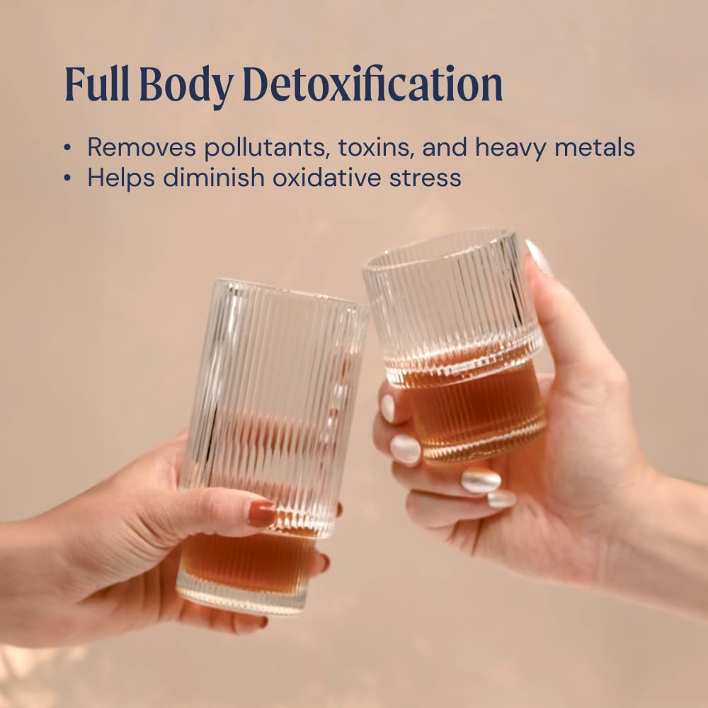 Glass of water beside Ameo Life Fulvic Acid & Mineral Complex bottle for easy intake