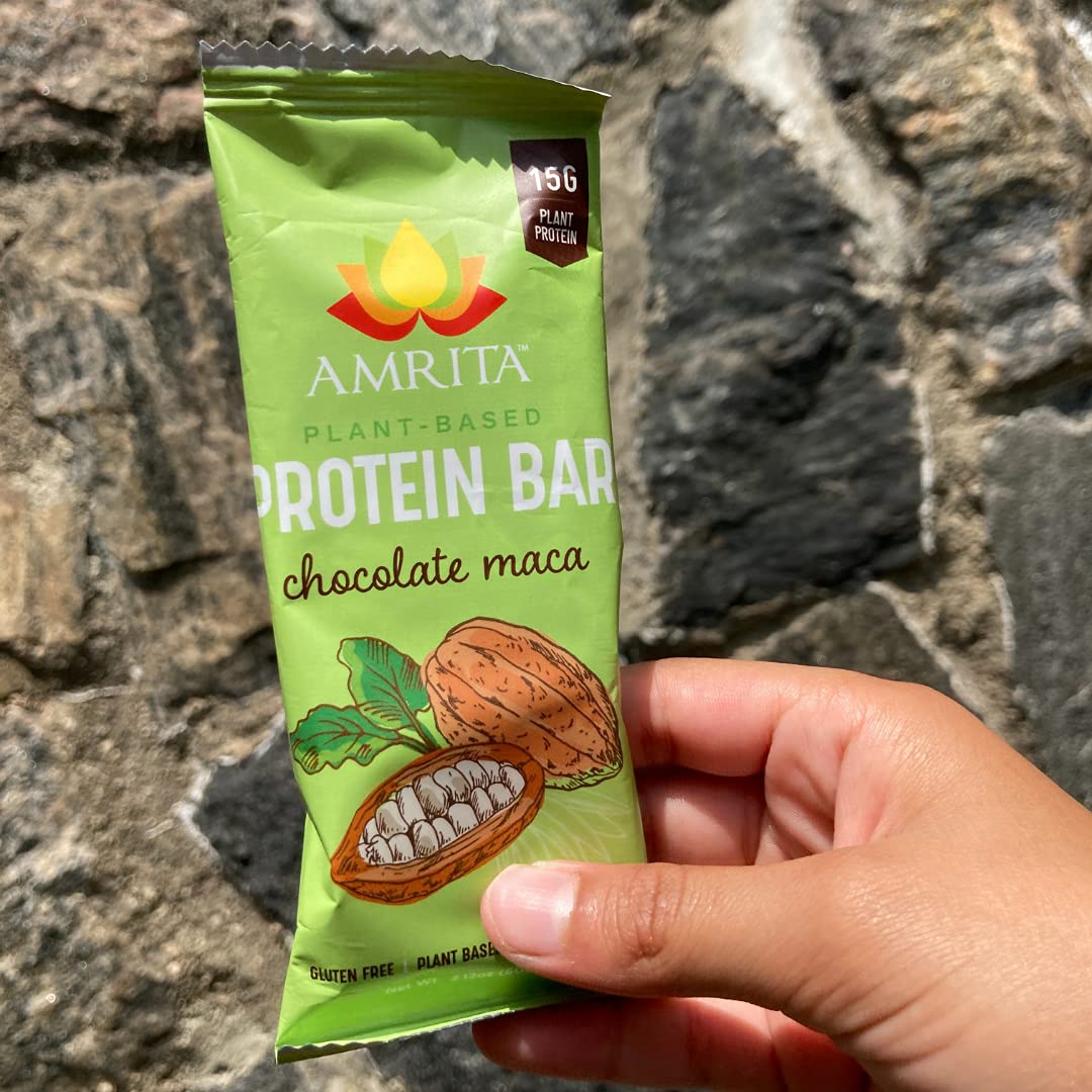 Amrita Nut Free Chocolate Maca Bar in gym bag, ideal post-workout protein snack.