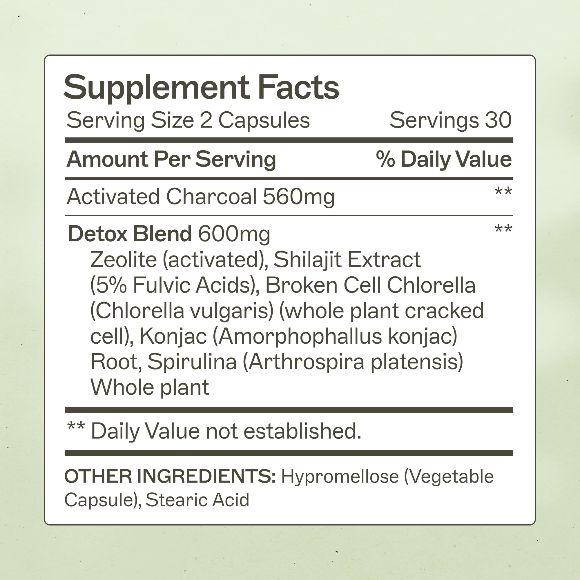 Amy Myers MD Charcoal Binder capsules close-up highlighting toxin-binding charcoal.