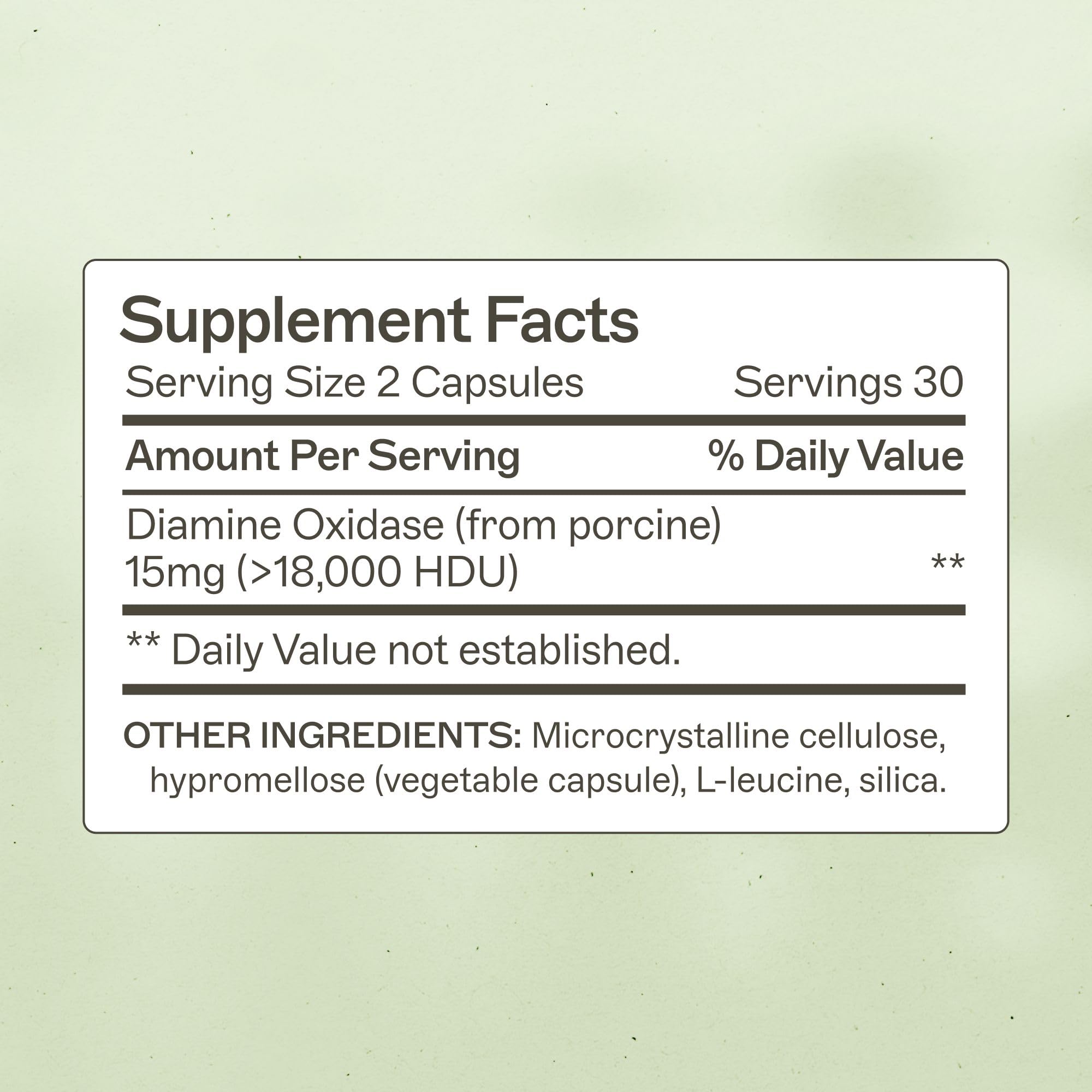 Amy Myers MD Histazyme DAO tablet close-up for digestion support.