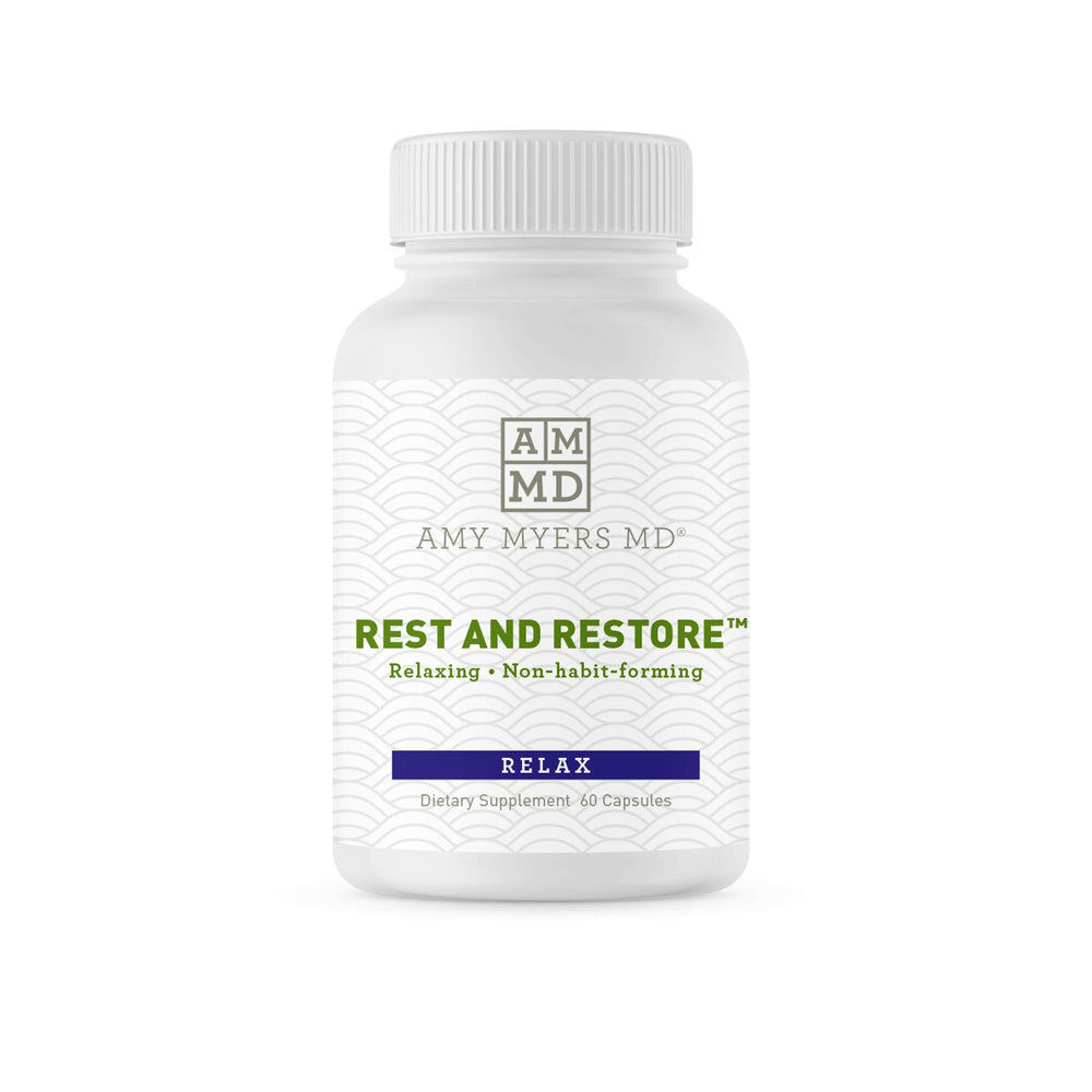 Amy Myers MD Rest and Restore bottle on nightstand promotes calm nightly preparation.