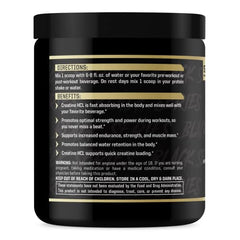 Anabolic Warfare Creatine Carnage scoop rests beside the jar for easy dosing.