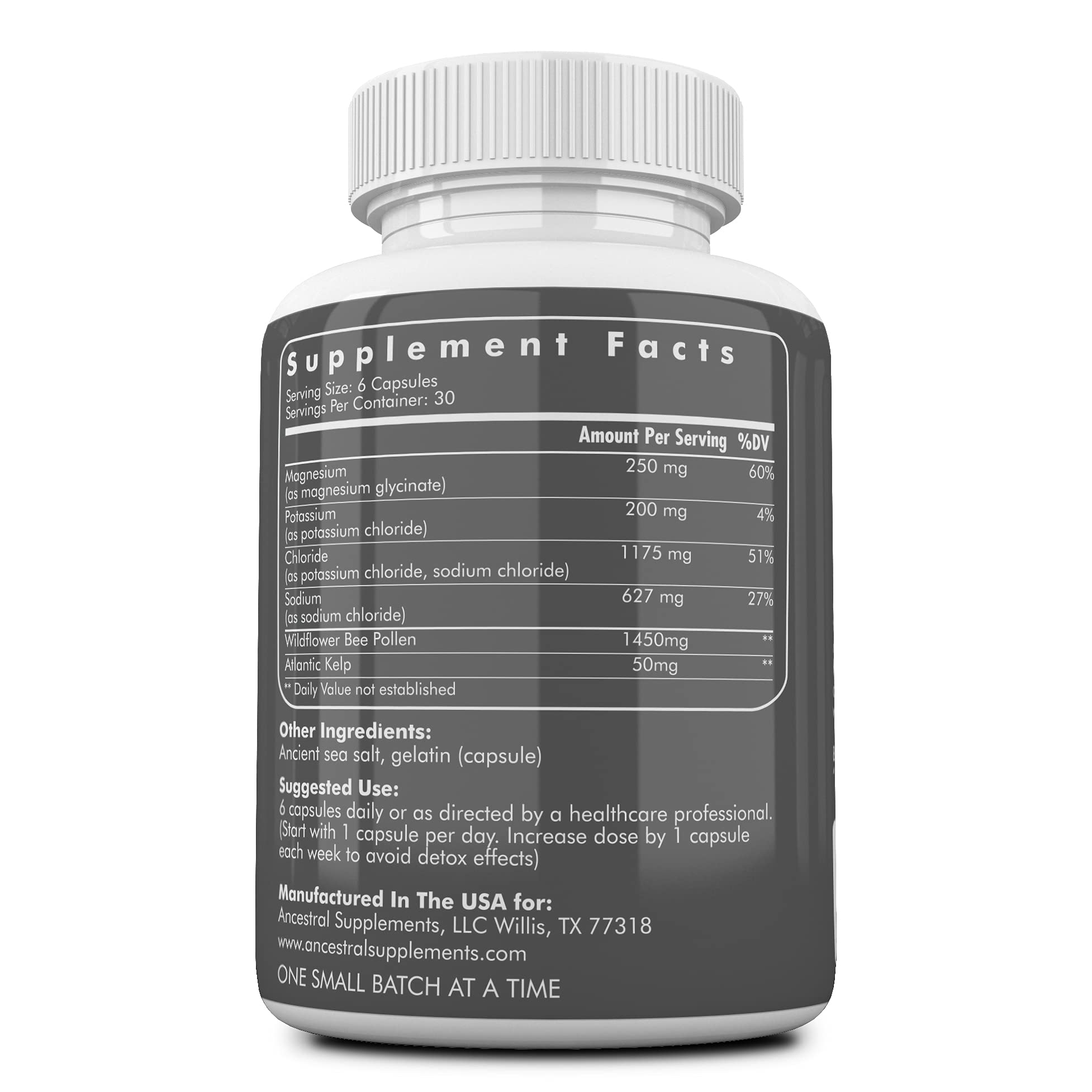 Pouring Ancestral Supplements Minerals & Electrolytes bottle for hydration.