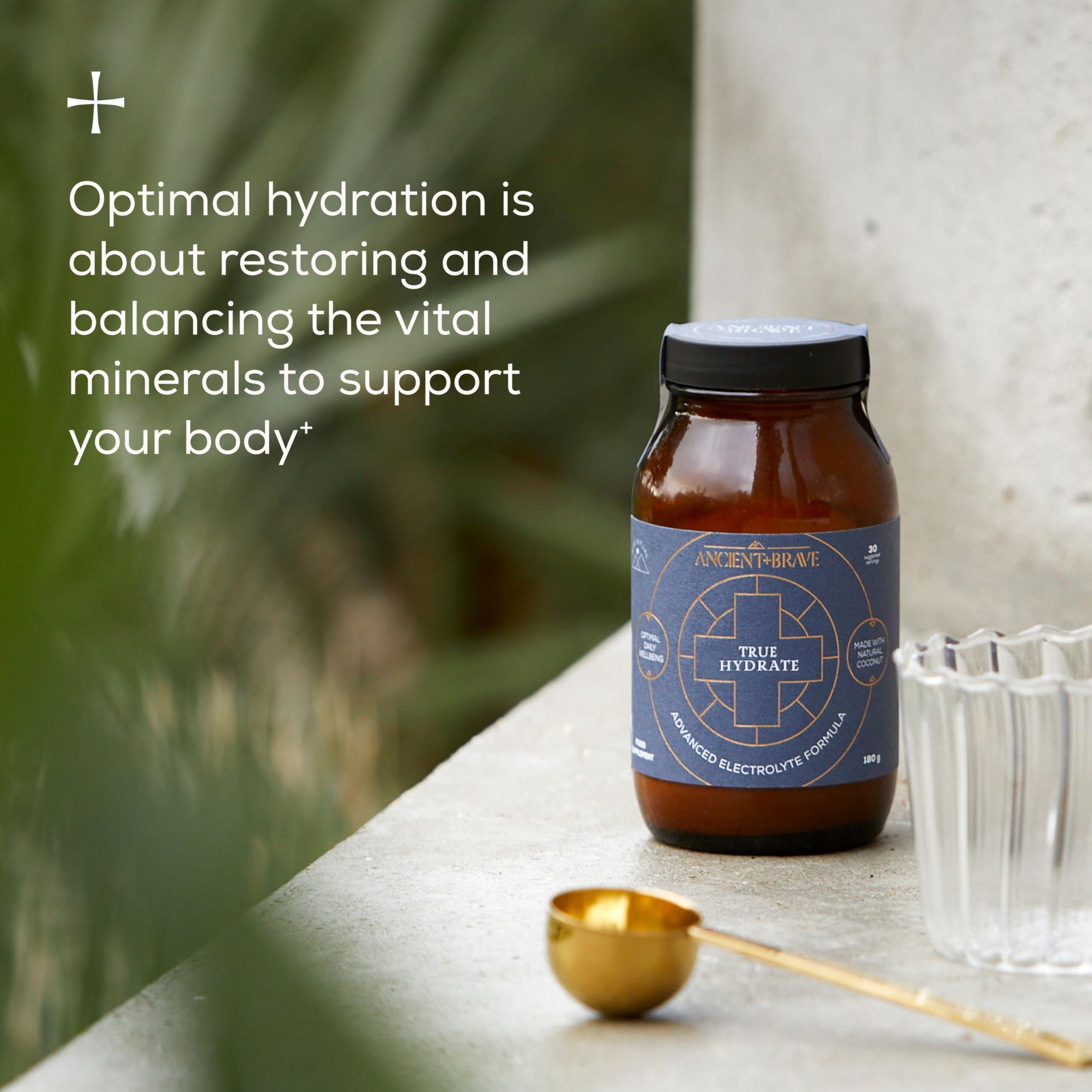 Ancient + Brave True Hydration powder mix swirling in water for daily hydration