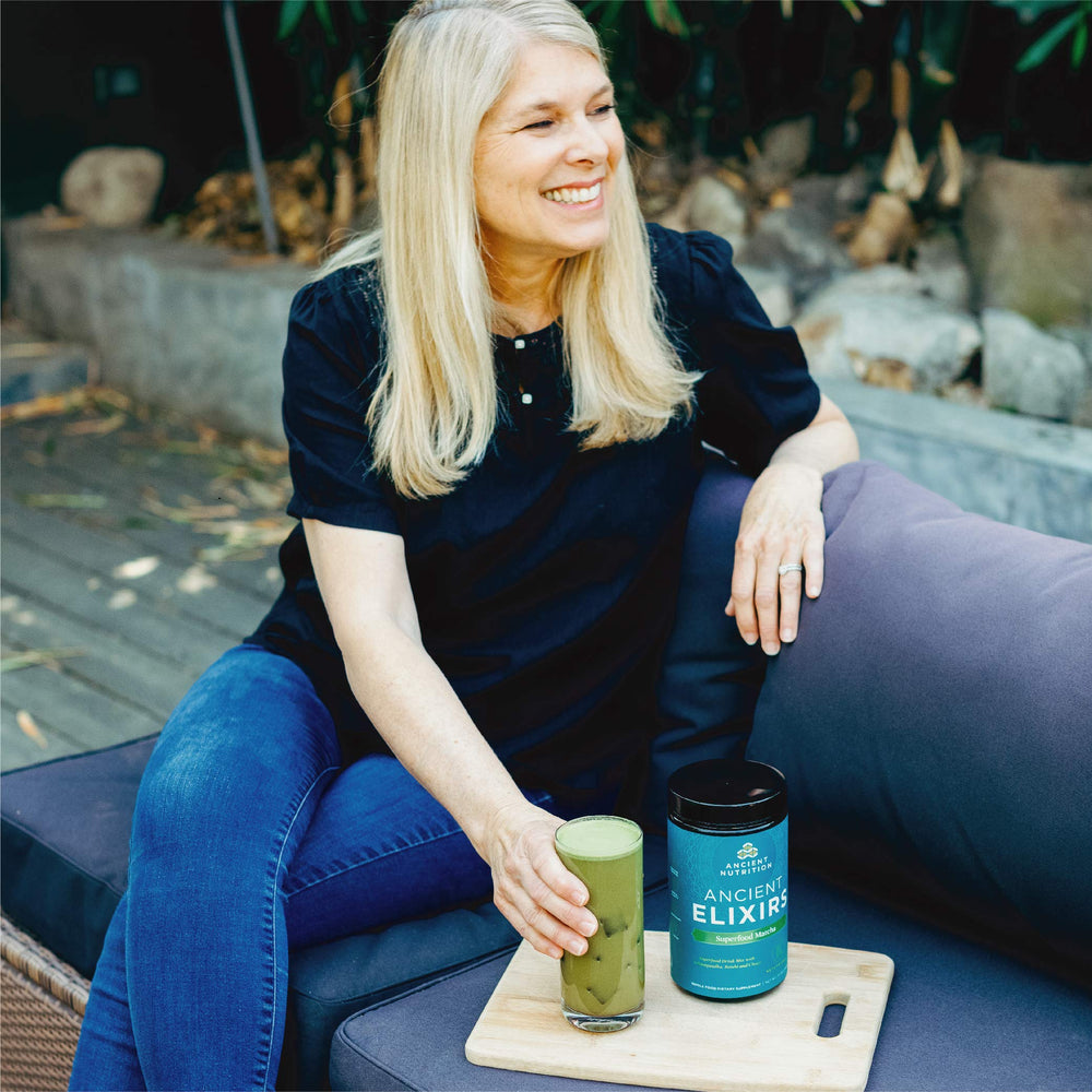 Ancient Elixirs matcha energizer in a mug.