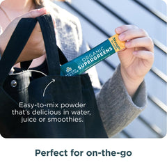 Ancient Nutrition SuperGreens being stirred in water for on-the-go energy