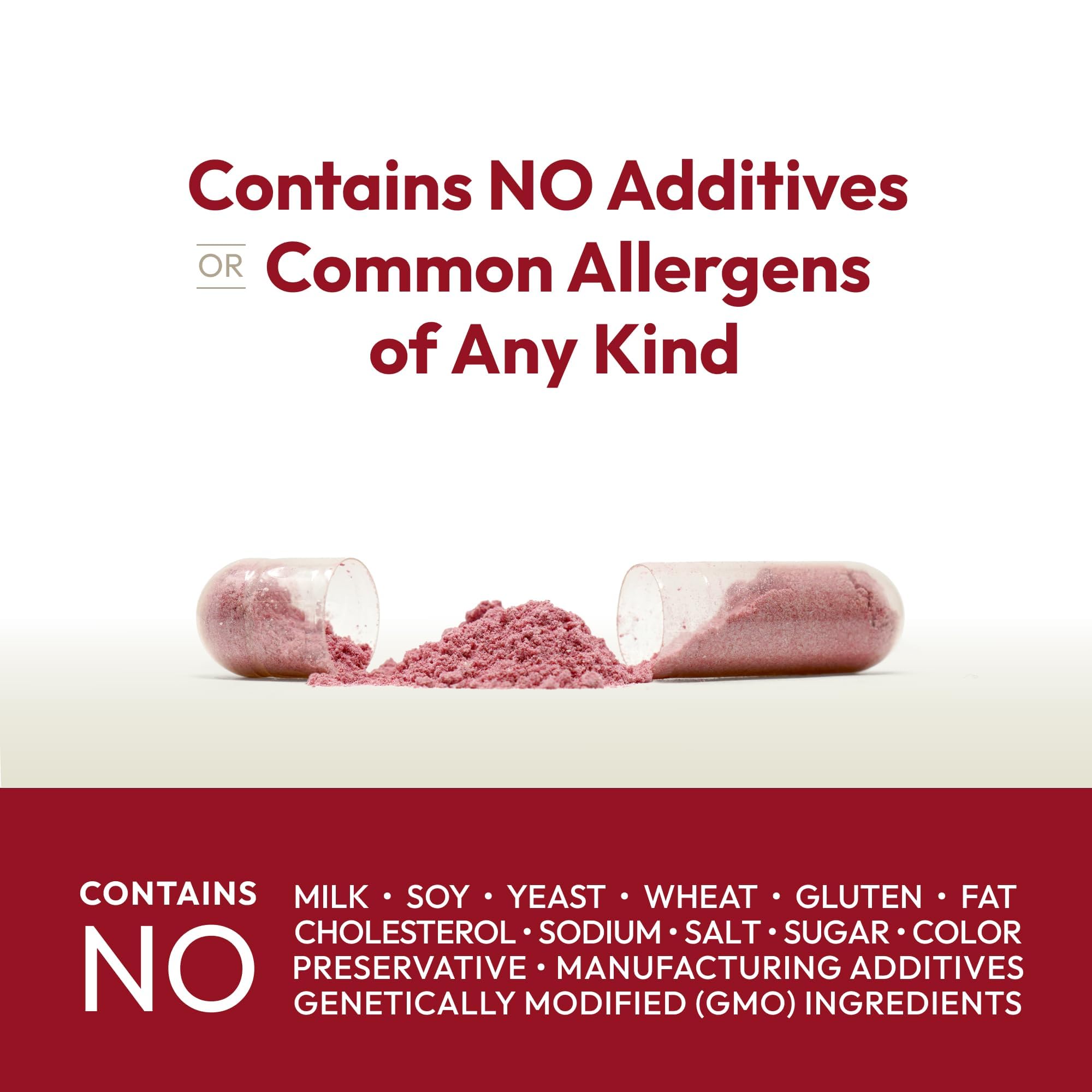 Pouring Andrew Lessman cranberry capsules for a quick daily dose.