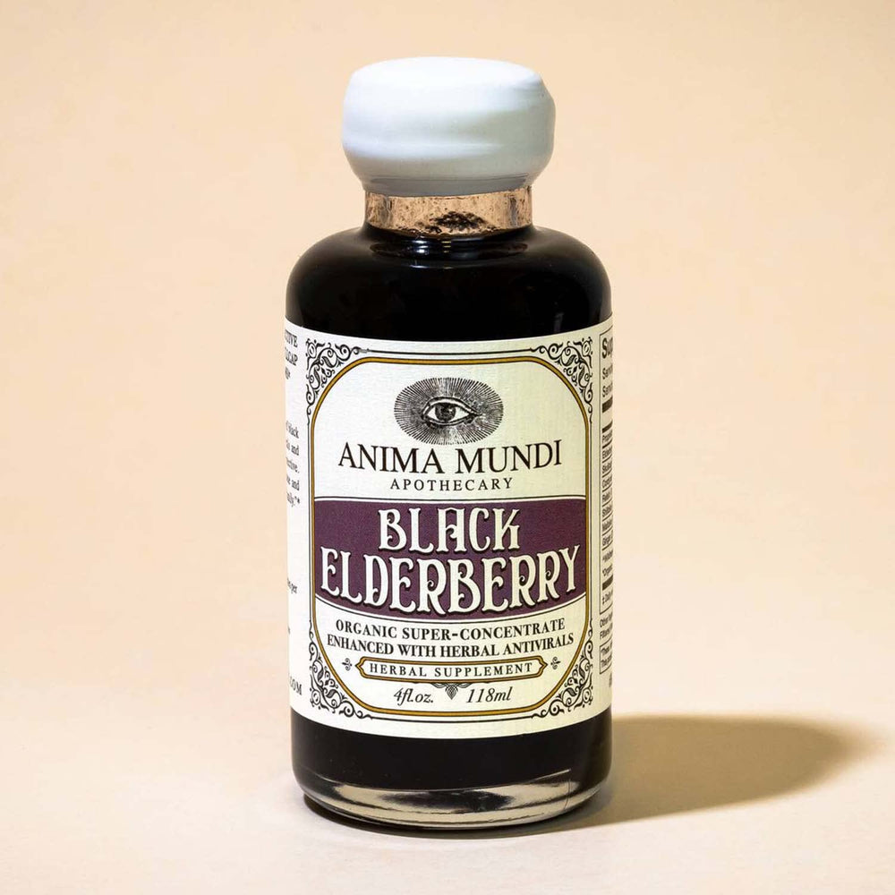 Closeup of Anima Mundi elderberry syrup bottle