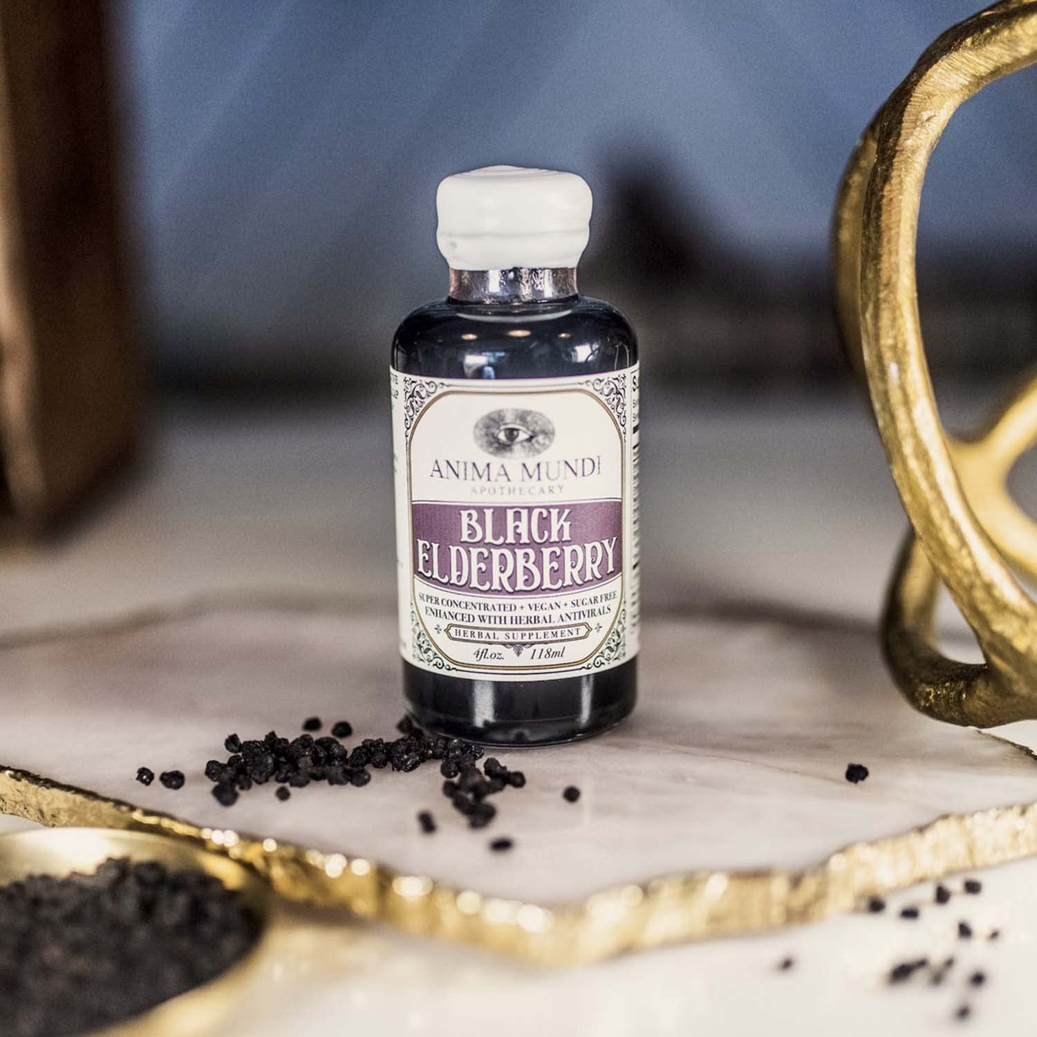 Anima Mundi elderberry syrup served with tea for a warm beverage