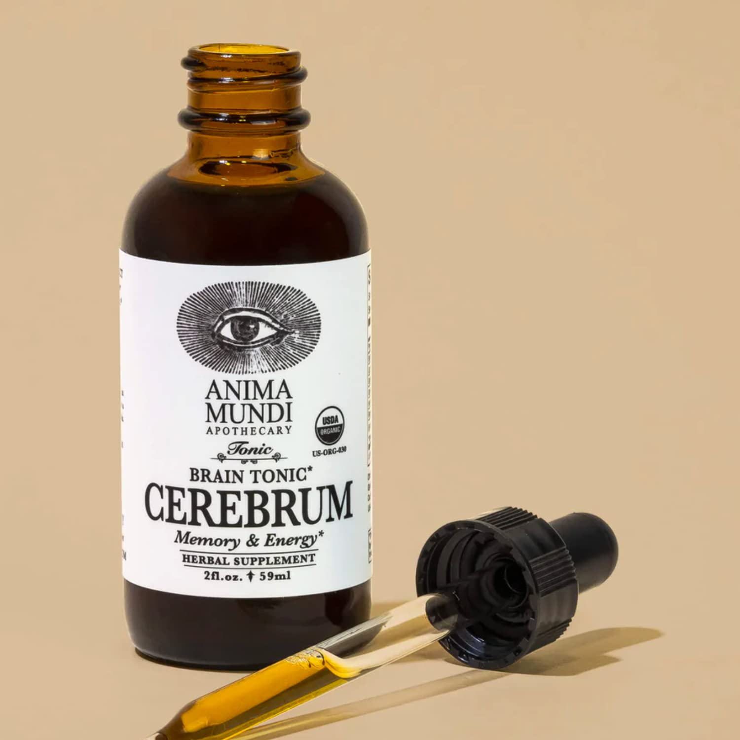 Anima Mundi Cerebrum drops close-up highlights herbal blend for cognitive support.