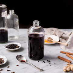 Anima Mundi elderberry syrup label close-up highlighting organic ingredients for wellness.