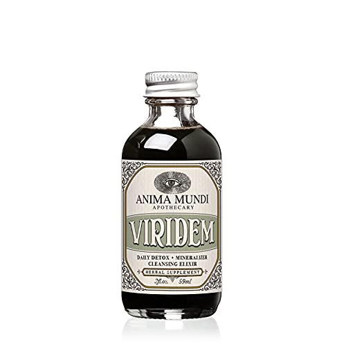Anima Mundi Viridem Detox bottle pouring for daily cleansing ritual.