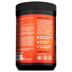 Dragon Berry-colored drink in glass with Animal Primal, signaling flavor