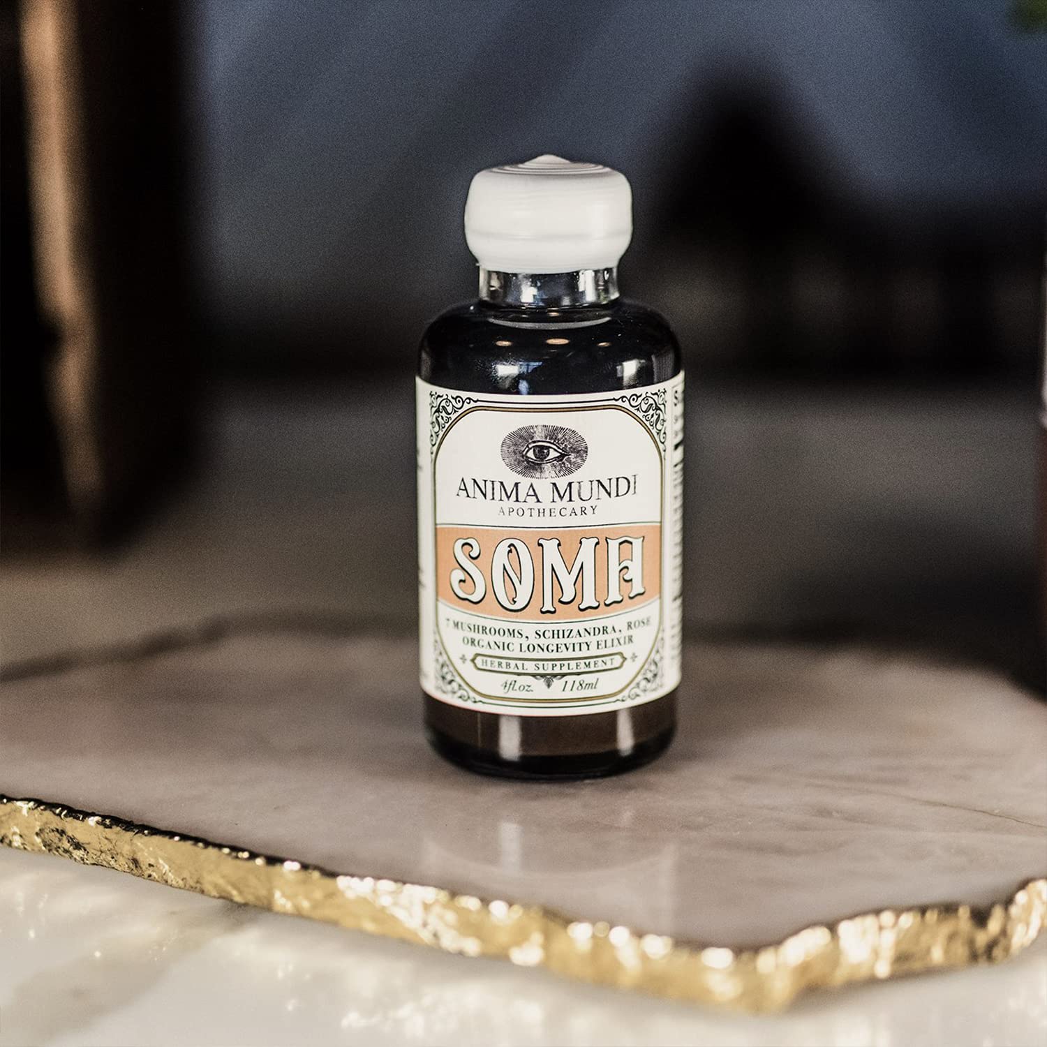 Anima Mundi Soma bottle label highlights seven mushrooms for holistic wellness exploration.