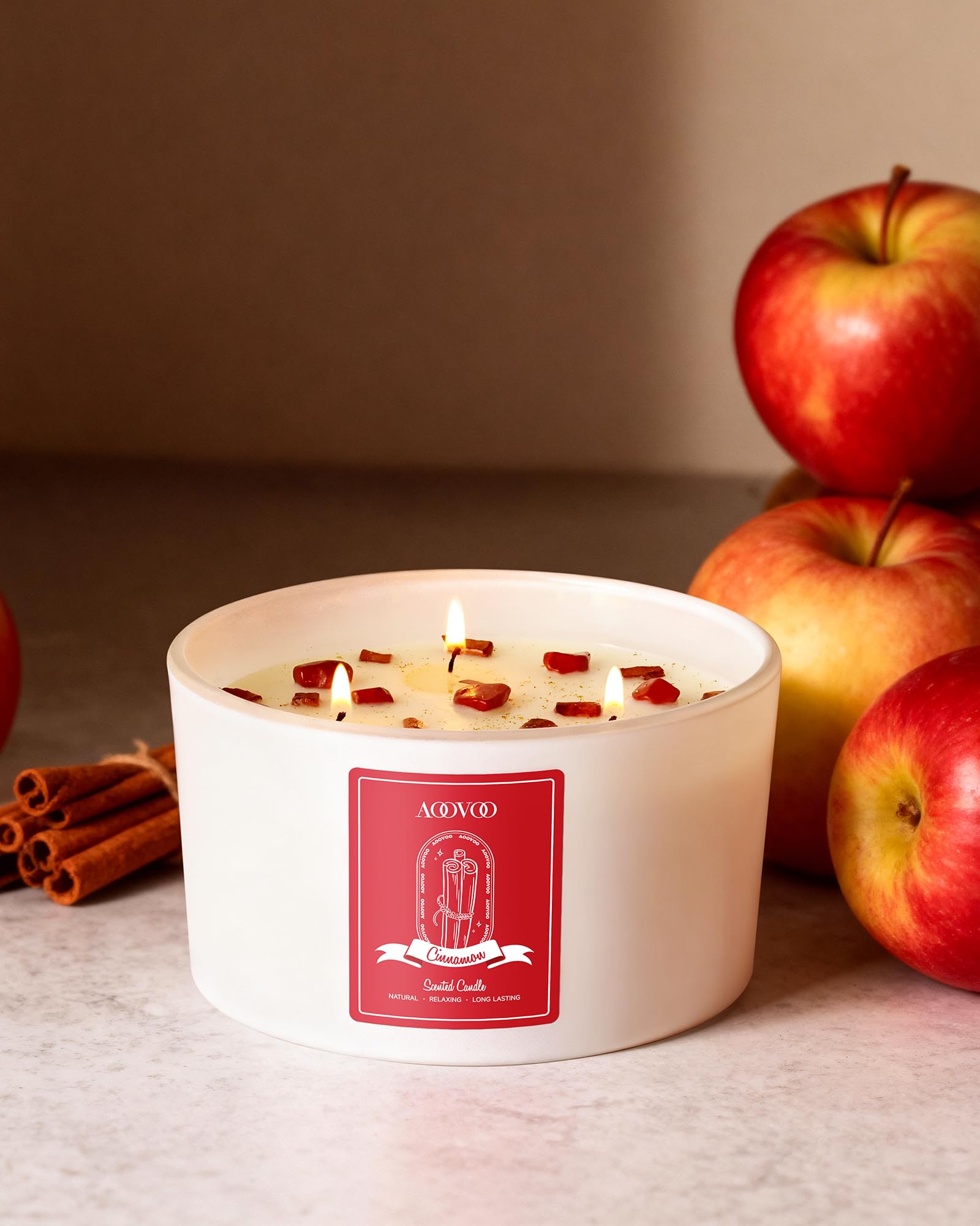 AOOVOO crystal-inside candle with Red Jasper for grounding ambiance.