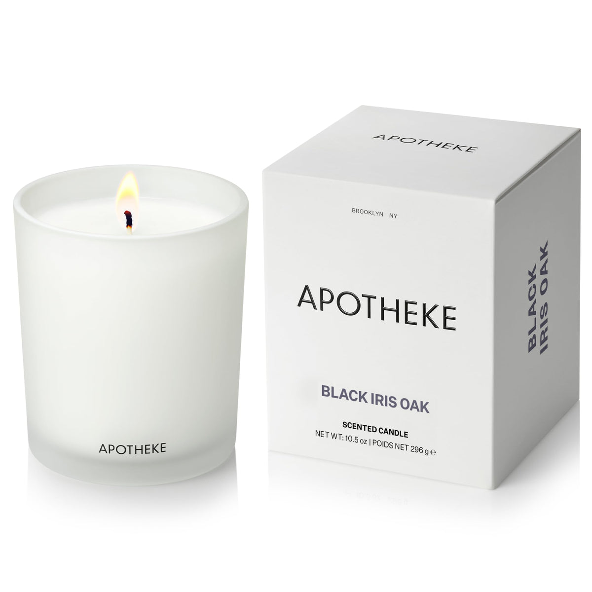 APOTHEKE Black Iris Oak candle in a glass jar for a sophisticated living room ambiance.