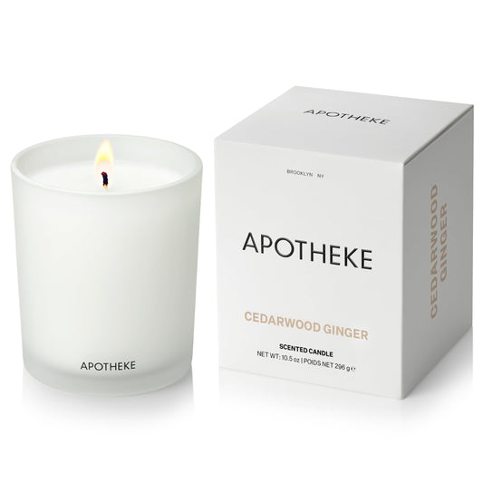 APOTHEKE Signature Cedarwood Ginger candle in a white jar for elegant home fragrance