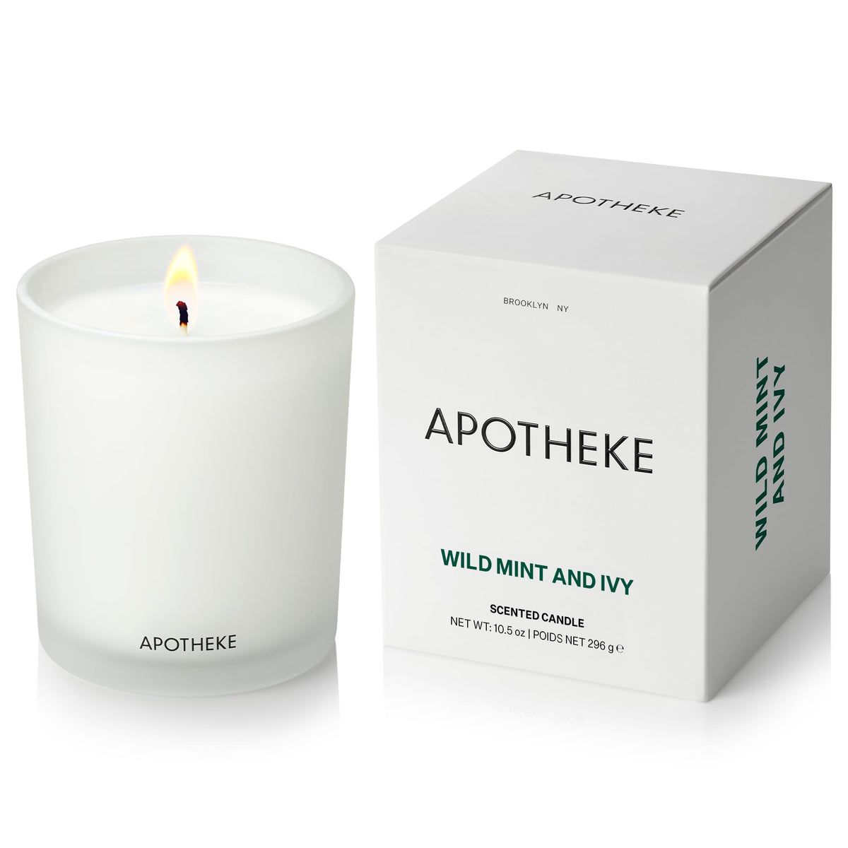 APOTHEKE Signature Wild Mint Ivy candle in a glass vessel for a refined home scent.