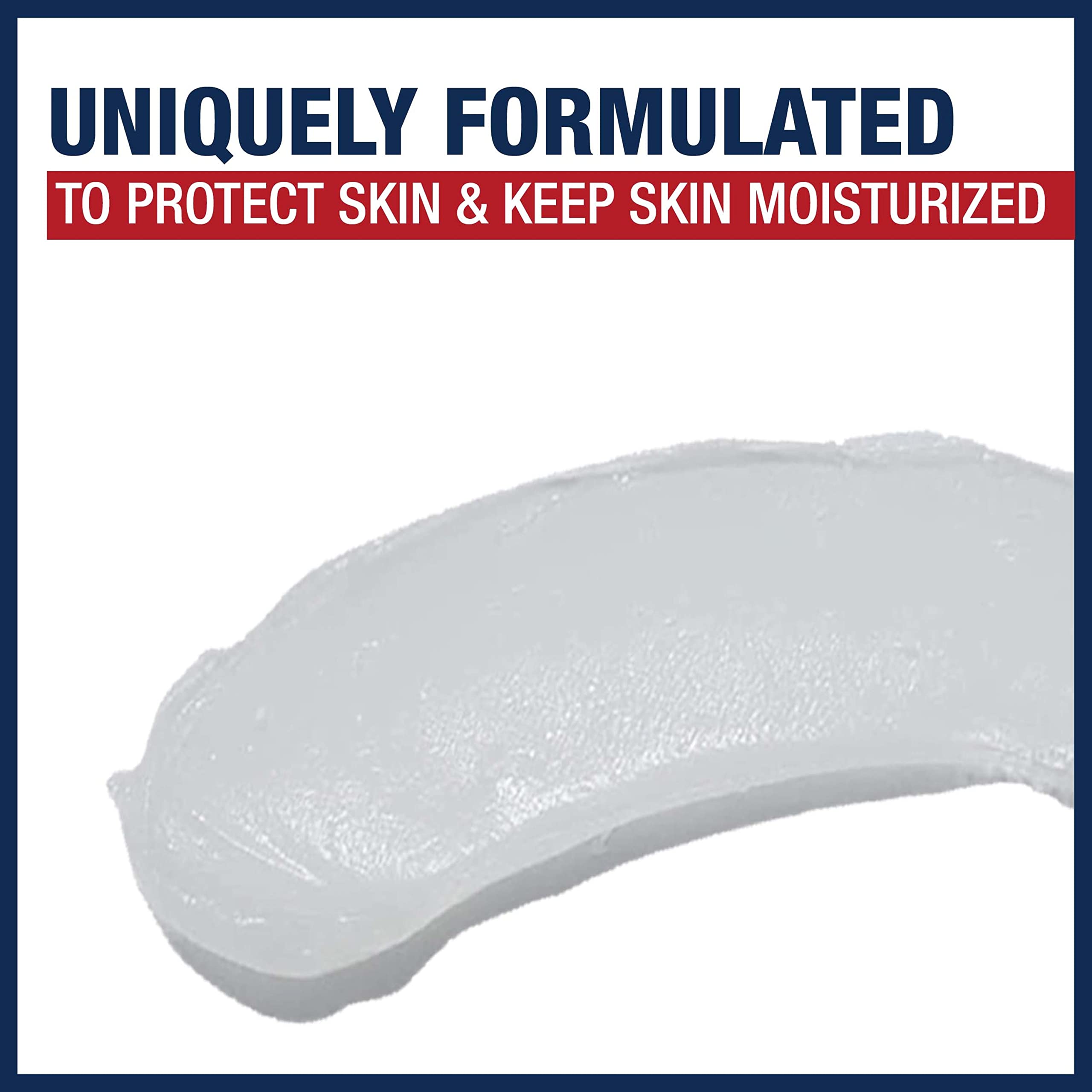 Hands applying Aquaphor Healing Ointment to soothe dry skin.