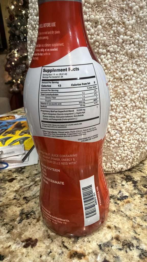 Ardyss Le’Vive Red Juice close-up of fresh fruit ingredients in each bottle
