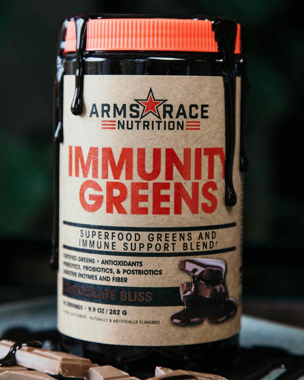 Arms Race Immunity Greens bottle back-label highlights vitamins and probiotics.