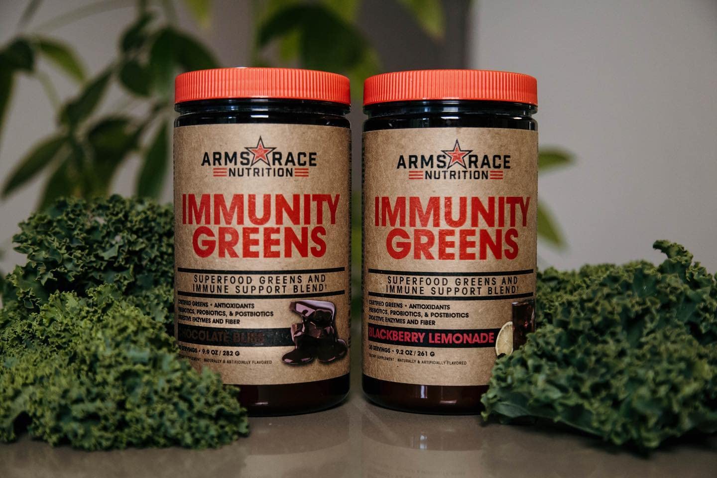 Arms Race Immunity Greens tub label features pineapple mango nutrition and probiotics.