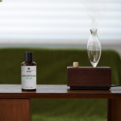 Aroma Manor Paris Girl diffuser in a serene bedroom ambiance.
