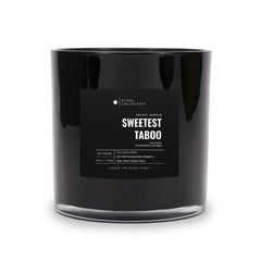 Aroma360 Sweetest Taboo Deluxe candle close-up highlighting bold hotel-inspired fragrance