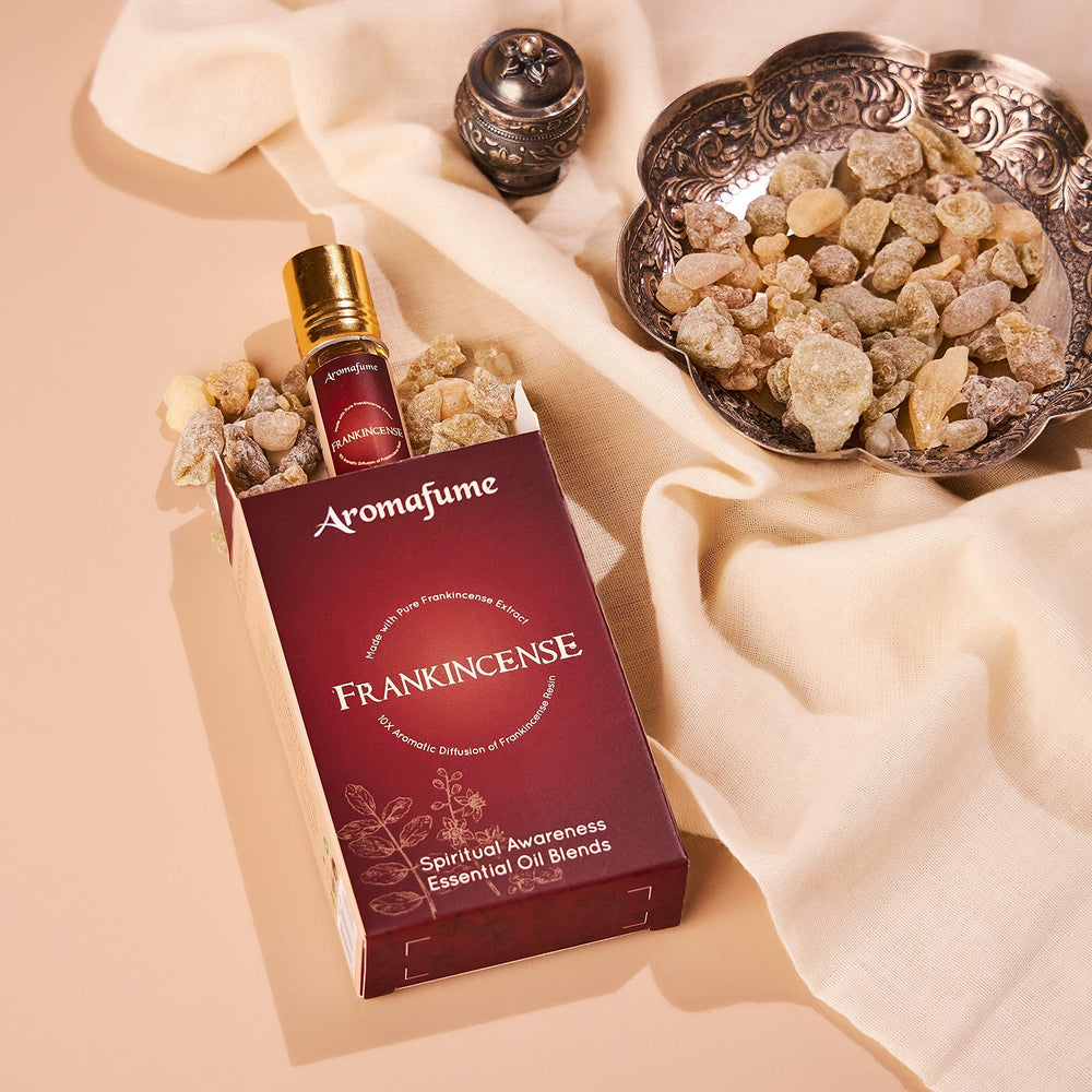 Aromafume Spiritual Awareness roll-on application on skin for on-the-go use.
