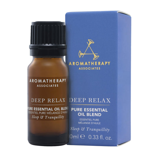 Aromatherapy Associates Deep Relax bottle-pour highlights vetivert and chamomile aroma for calm.