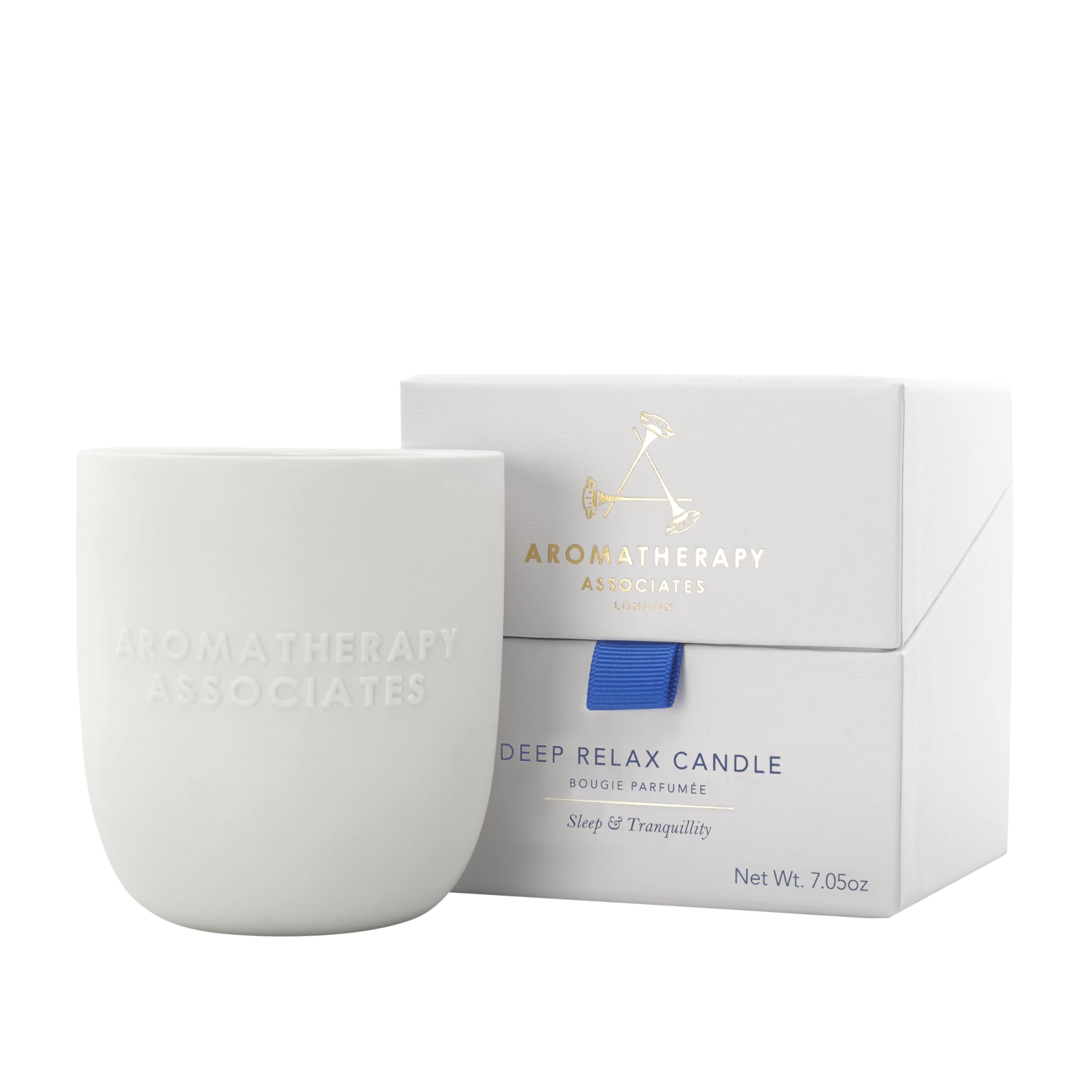 Aromatherapy Associates Deep Relax candle in a ceramic holder for calming ambiance.