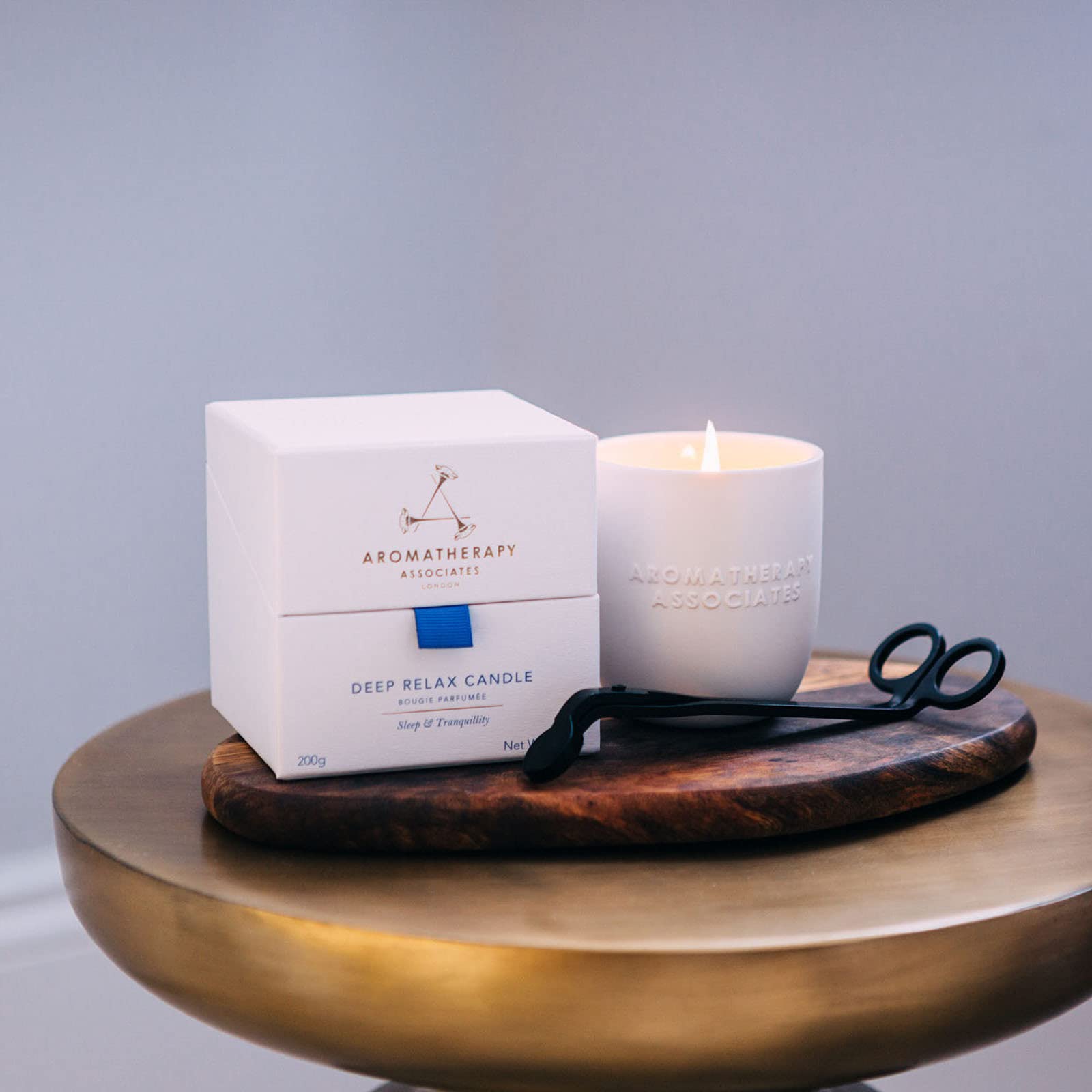 Aromatherapy Associates Deep Relax candle features vetivert and chamomile aroma.