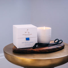 Aromatherapy Associates Deep Relax candle features vetivert and chamomile aroma.