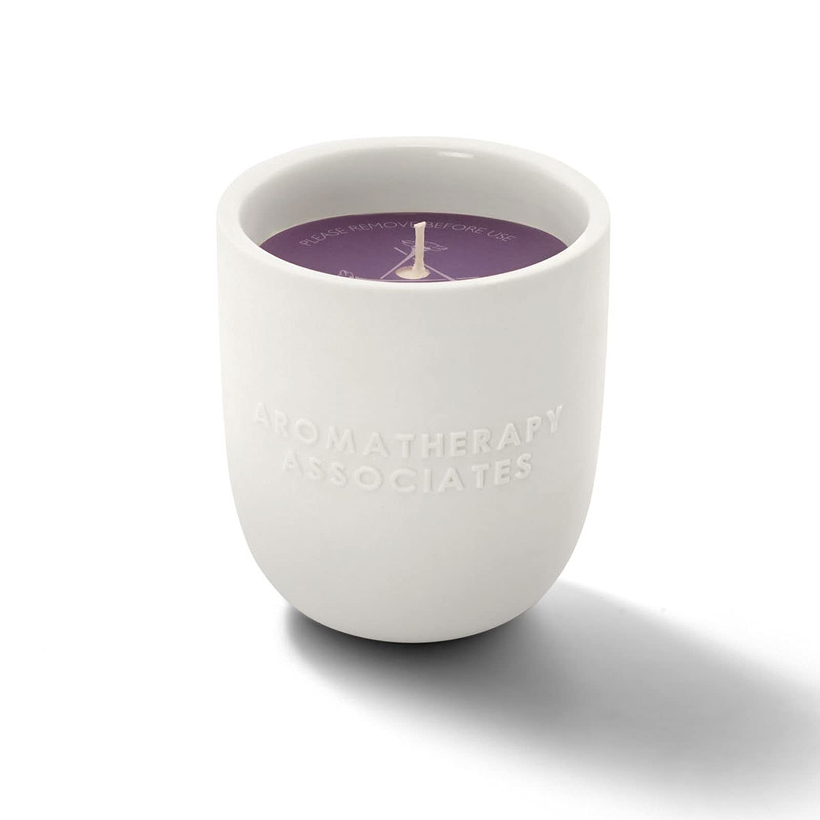 Aromatherapy Associates De-Stress Candle lit, releasing calming aromas for focused moments