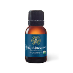 Aromatics International Frankincense Oil bottle pour for diffuser aroma.
