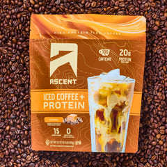 Mixing glass with Ascent Caramel Iced Coffee Protein Powder for a balanced sip.
