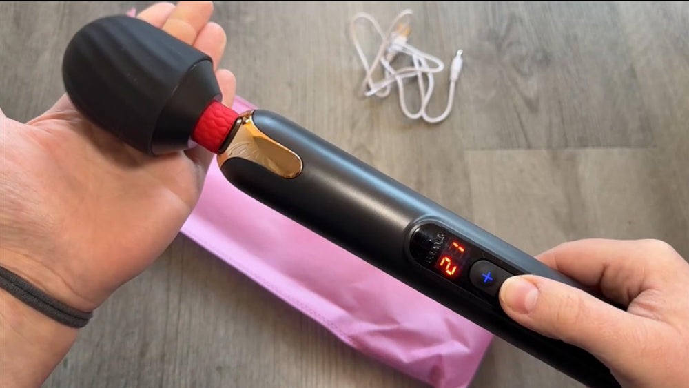 Asopal massager shown charging via USB for quick top-ups