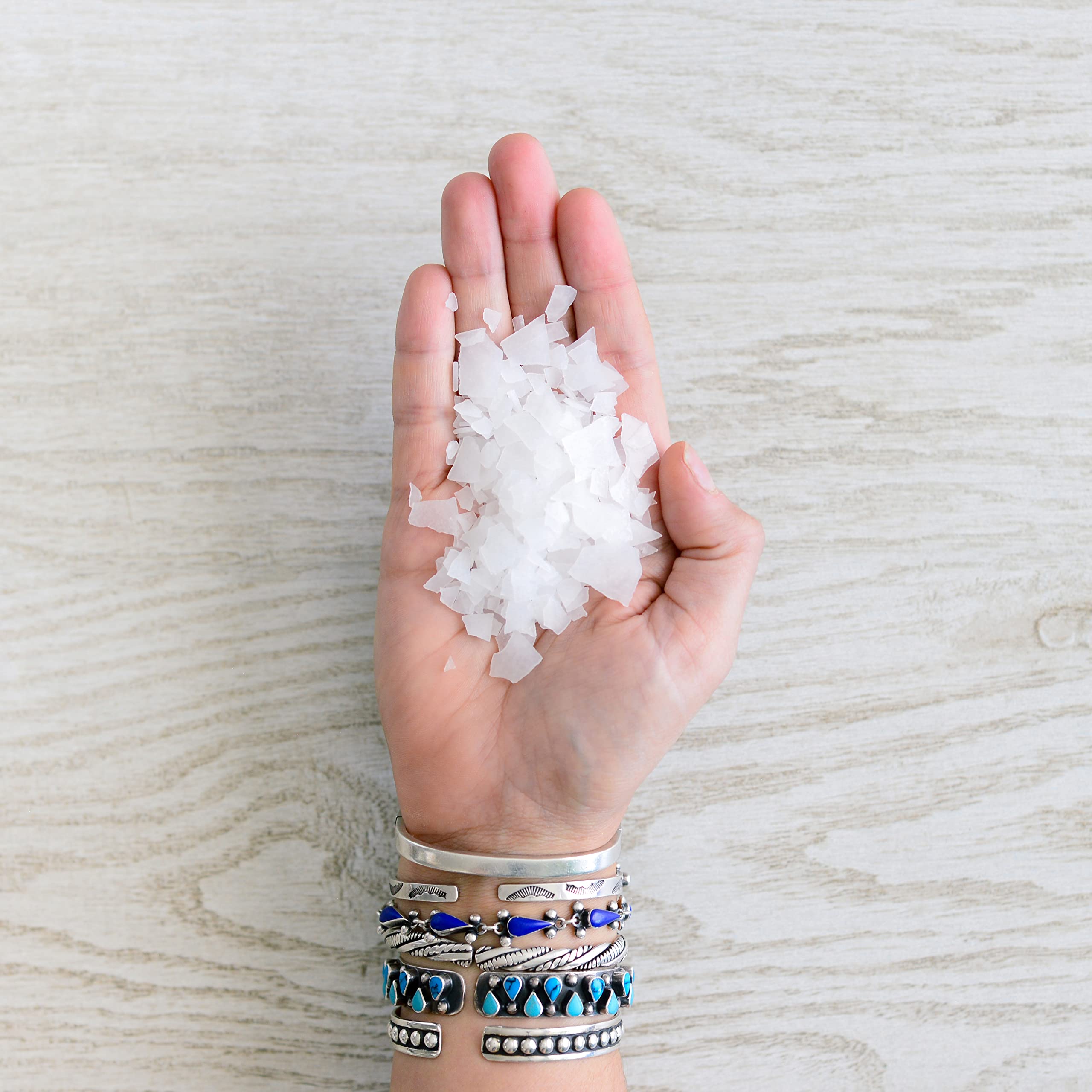 ASUTRA magnesium bath flakes soften skin while you soak.