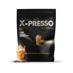 Athlean-X PRO-30G caramel macchiato shake in glass for post-workout recovery