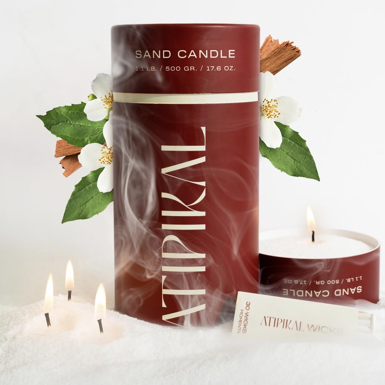ATIPIKAL sand candle floats on water, perfect for decorative poolside ambiance.