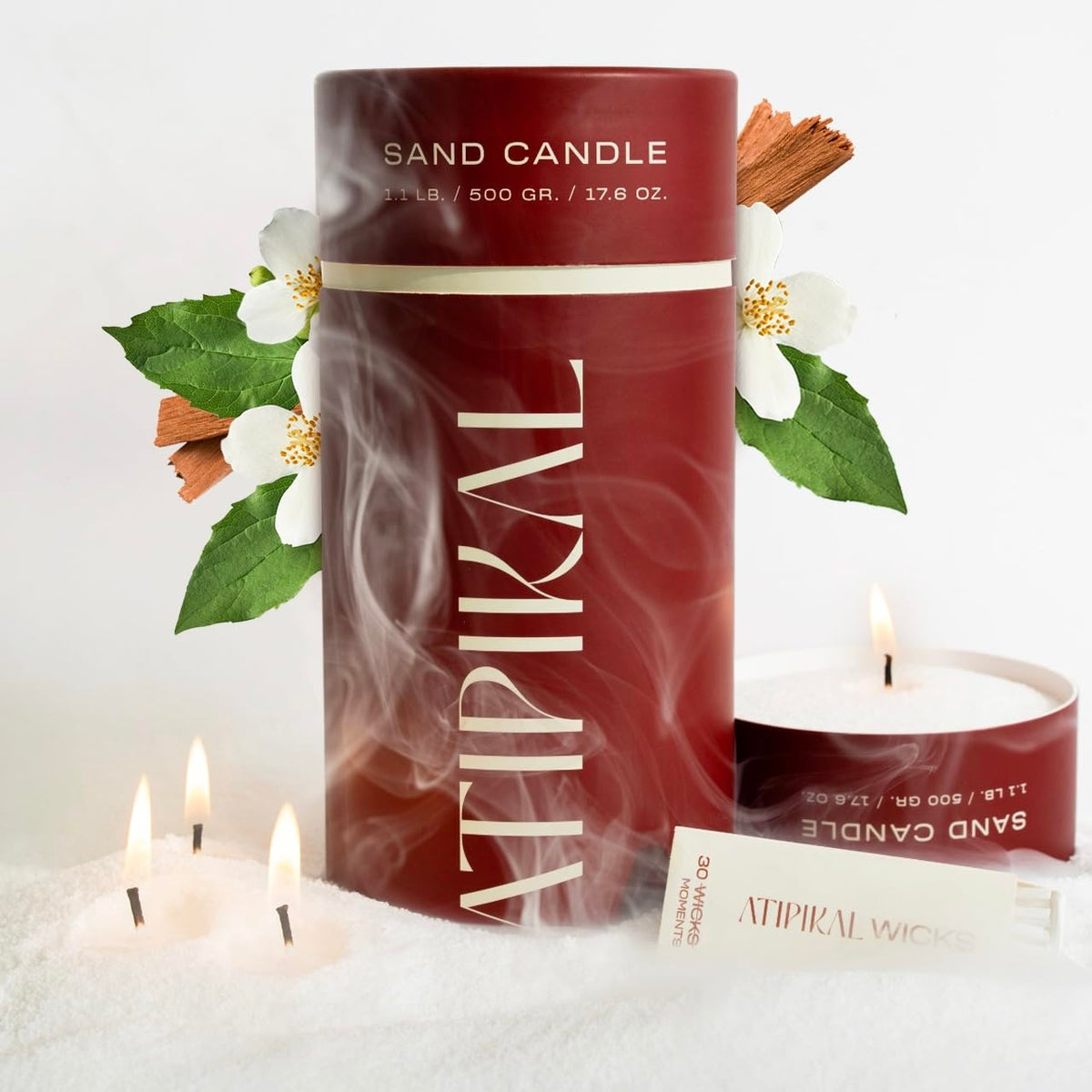 ATIPIKAL sand candle floats on water, perfect for decorative poolside ambiance.
