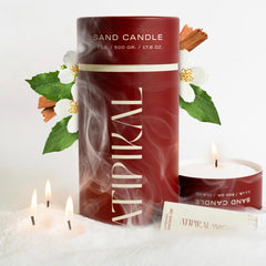 ATIPIKAL sand candle floats on water, perfect for decorative poolside ambiance.