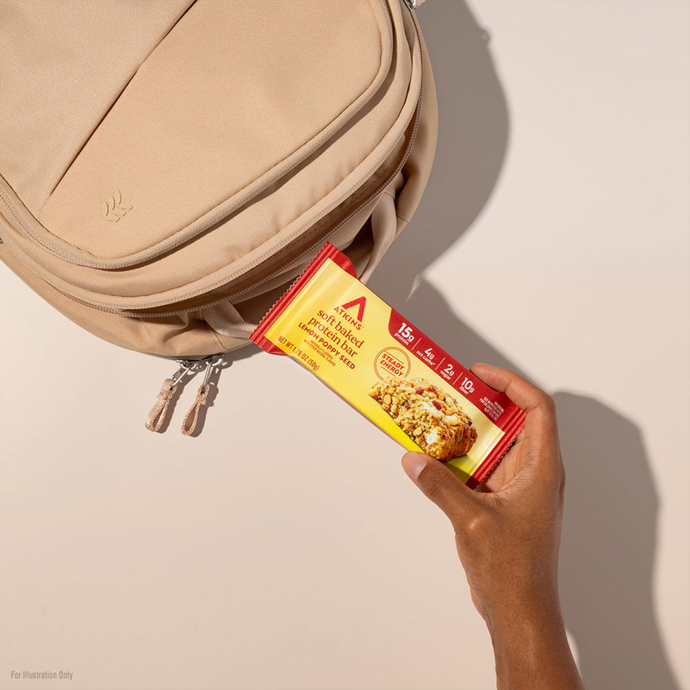 Grab-and-go Atkins bar on a desk for a quick satisfying snack
