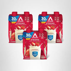 Atkins Strong Strawberry bottle on desk as a convenient daily snack.