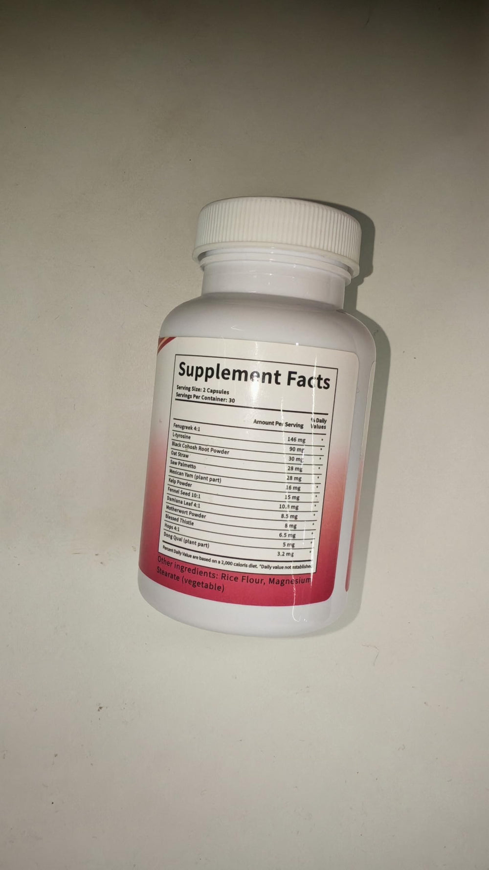Close-up of True Fem capsules showing smooth texture for easy swallowing.