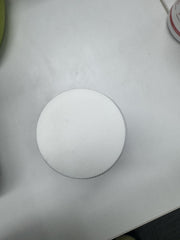 Woman taking a True Fem capsule as part of a daily routine.