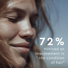 AURELIA Hair Revive capsules close-up showing nutrient-rich formula.